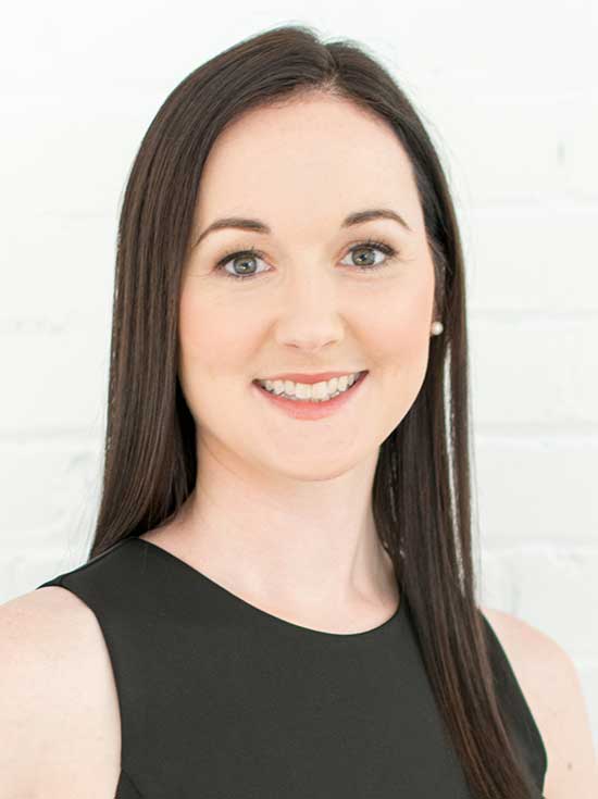 Confident woman smiling, demonstrating strong communication skills for personal and professional gro.